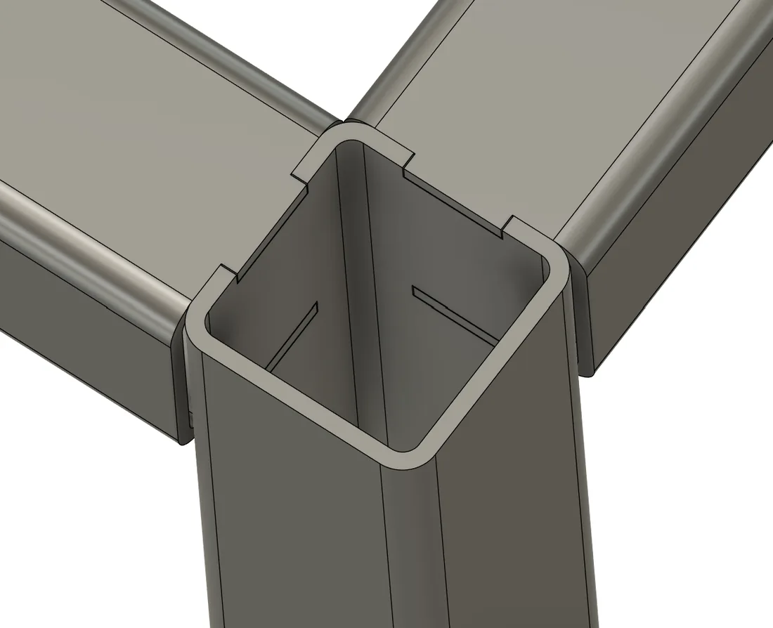 Three-way corner with tabs seated in the slots of the post