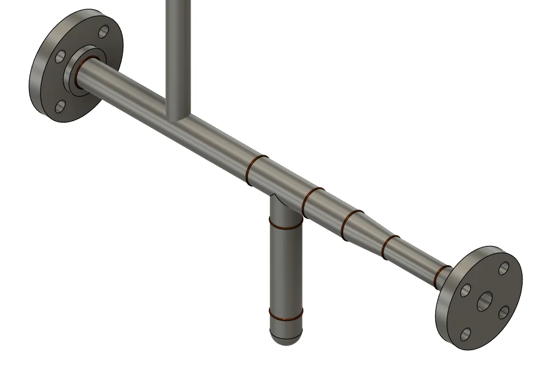 Pipe header with a slip-on flange, equal tee with a capped branch, concentric reducer and weld-neck flange, every joint carrying a bronze weld bead ring